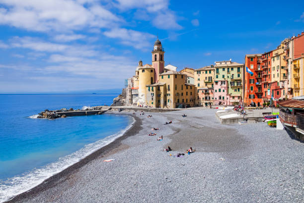 Colorful buildings lined up on the Camogli promenade - Liguria, Italy stock photo