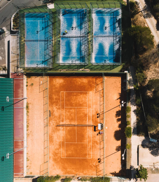 Aerial top down drone view of tennis and padel courts in a public sporting area stock photo