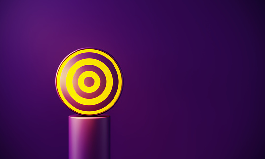 Yellow target glowing before purple background. Horizontal composition with copy space.