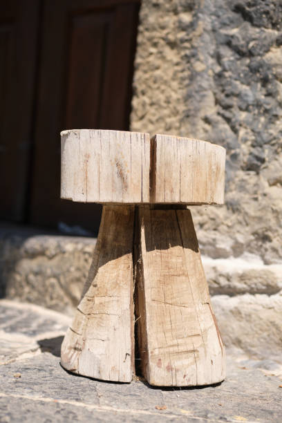 Close-up of a handmade wooden stool.