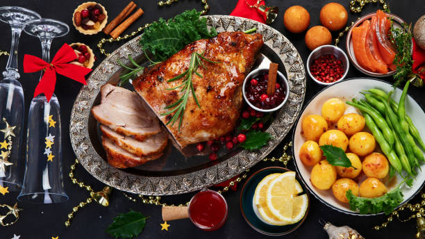 istock Traditional Christmas dinner on dark background. 1421280859