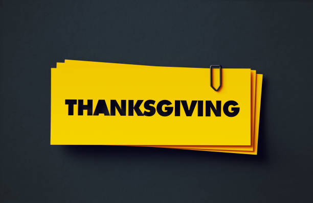 istock Thanksgiving Written Yellow Adhesive Notes Sitting Over Black Background 1421281220
