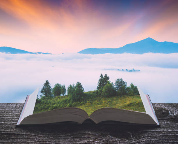 istock Alpine valley on a book 1421282684
