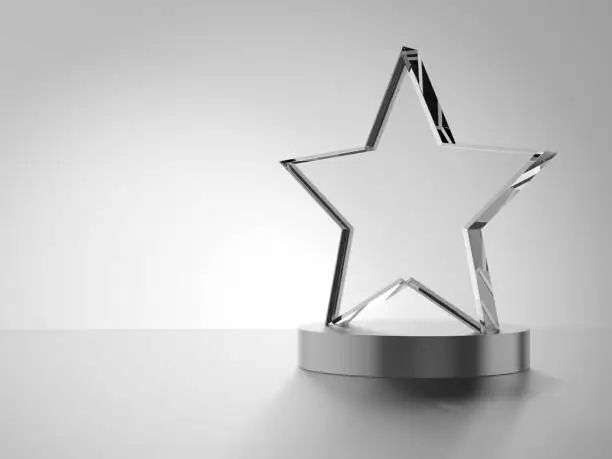 Photo of Glass award isolated on white background. Star.