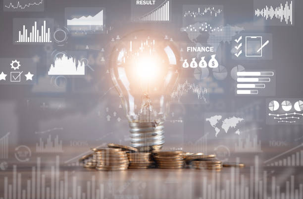 istock Light bulb with a business graphs and charts. Idea. Business 1421283485