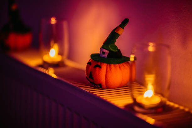 Pumpkin and  candle decorations for a Halloween party.