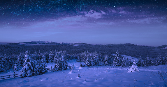 Frozen night in carpathian mountains with many stars in a sky. Europe travel, beauty world, Happy New Year, Marry Christmas.