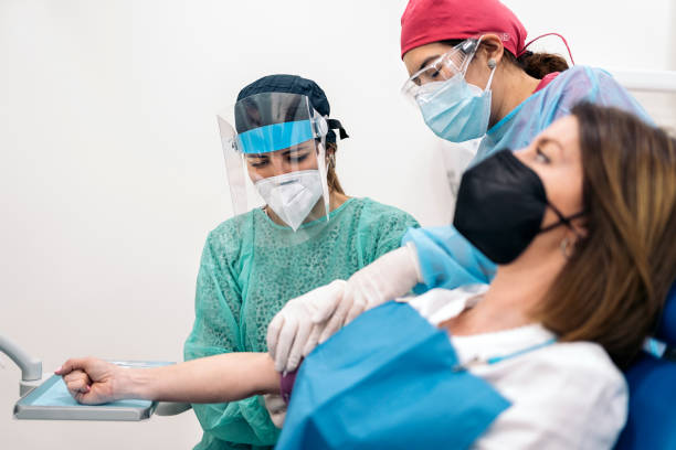 istock Blood Drawing in Clinic 1421290628