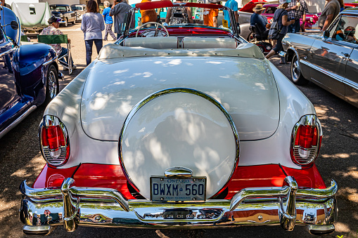 Falcon Heights, MN - June 17, 2022: High perspective rear view of a 1956 Mercury Montclair Convertible at a local car show.
