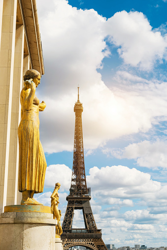 Gold statues at the Esplanade du Trocadero with Eiffel tower, Paris, France