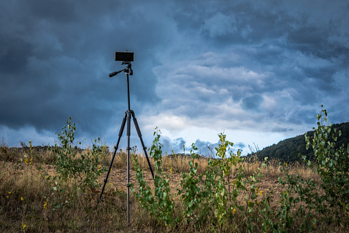 Smartphone filming a stormy sky