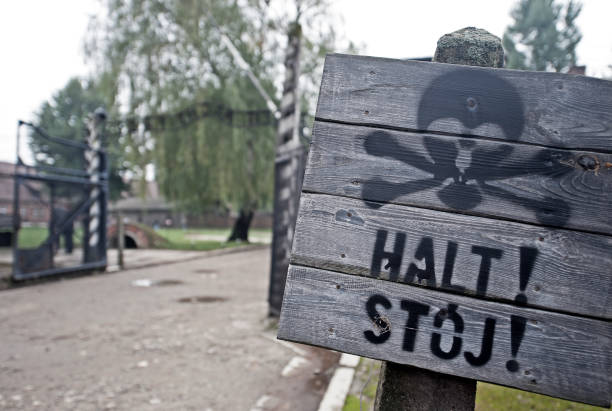 Halt stop sign by main entrance, Auschwitz-1, Krakow, Poland. stock photo