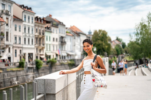 istock Young woman enjoying in the city 1421302012