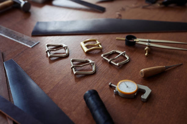 istock Tools And Buckles For Handmade Leather Designs 1421303775