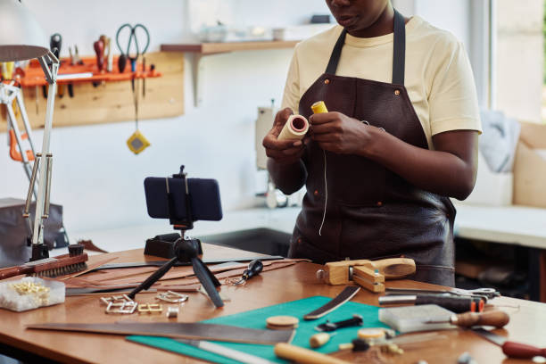 istock Recording Video In Leatherworking Shop 1421303953