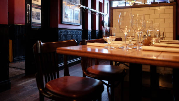 istock Wine glasses on a table in a restaurant 1421307908