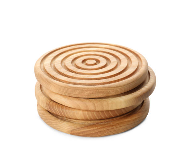 istock Stylish wooden cup coasters on white background 1421310793