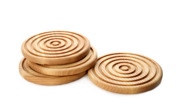 istock Stylish wooden cup coasters on white background 1421311052