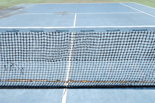 istock tennis court with the net 1421313195