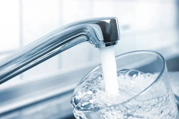 Photo of A glass of clear water from the kitchen tap