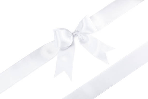 istock Satin ribbons with bow on white background, top view 1421313805