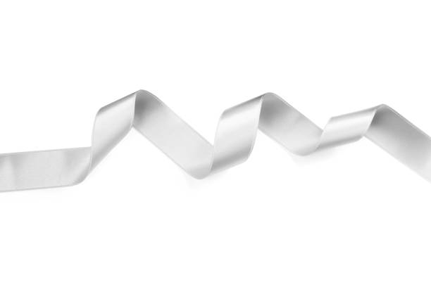 Silver satin ribbon on white background, top view