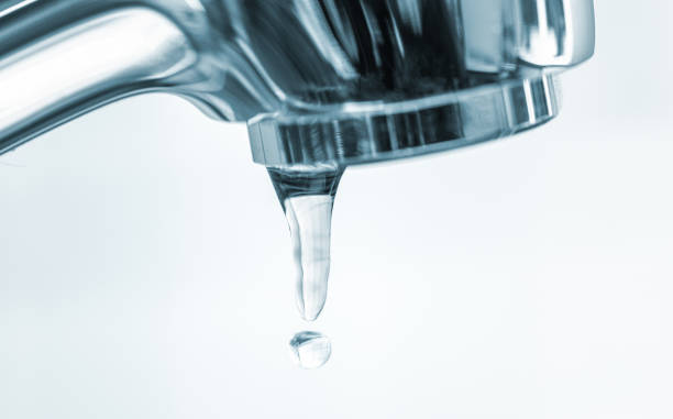 istock Dripping faucet in the kitchen 1421314226