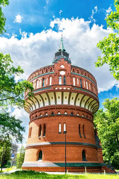 Ancient brick water tower in Bydgoszcz, Poland. Historical industrial building and famous tourist landmark