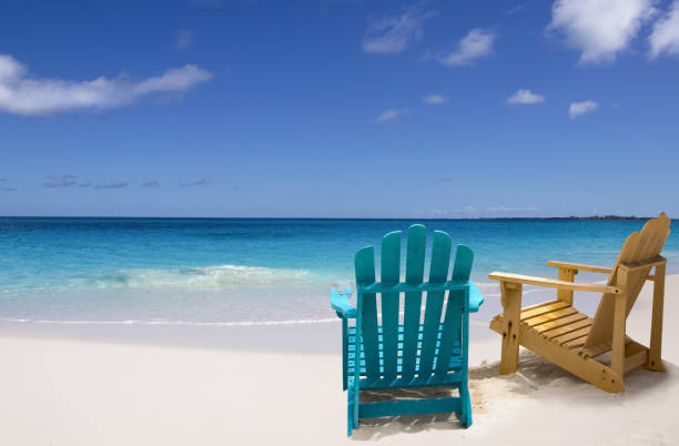 istock Two beach chairs on white sand Caribbean coast 1421320274