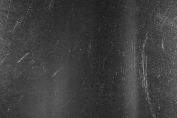 istock Old metal surface with scratches as background, closeup 1421320477