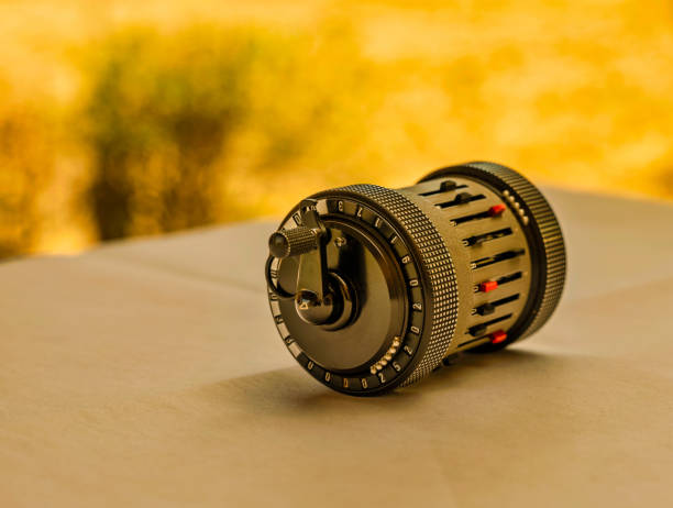 istock Curta hand-held mechanical calculator top perspective on a desk 1421323505