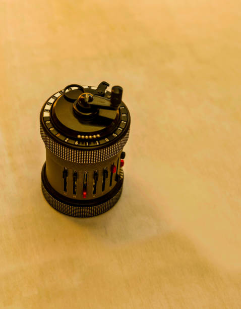 istock Curta hand-held mechanical calculator top on a desk 1421323709