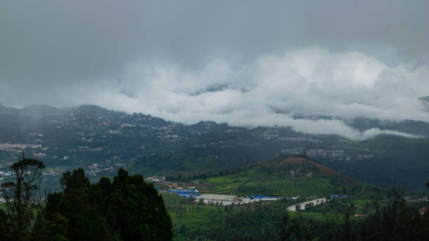 istock Doddabetta Peak in Cloud Ooty National Park  View Trip Photo 1421325858