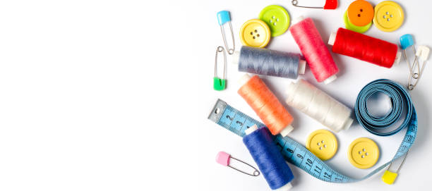 istock Accessories for sewing on a white background. Closeup. Copy space 1421325988