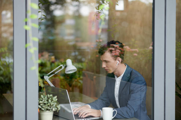 istock Young Entrepreneur Working on Laptop 1421330032