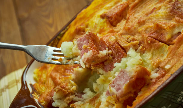 istock Cheesy sausage potato casserole 1421330532