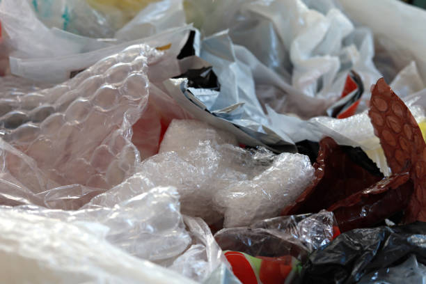 istock Heap of used plastic bags background. Concept problem environmental pollution plastic. 1421331018