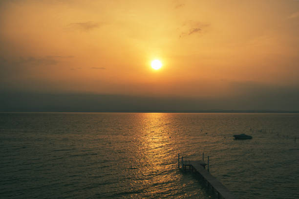 Watching the sun rise on Lake Garda