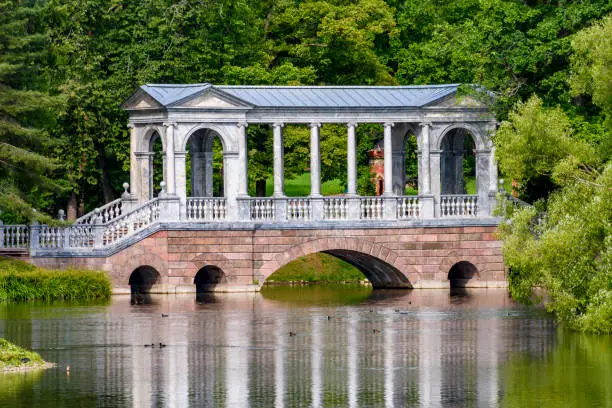 Photo of Marble bridge in summer in Catherine park, Tsarskoe Selo (Pushkin), Saint Petersburg, Russia