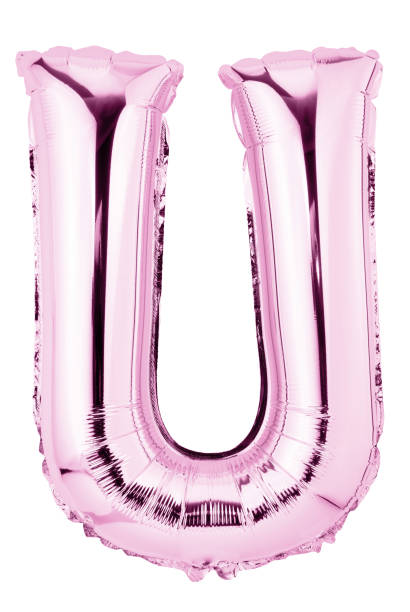 istock Letter U in pink mylar balloon isolated on white 1421349357