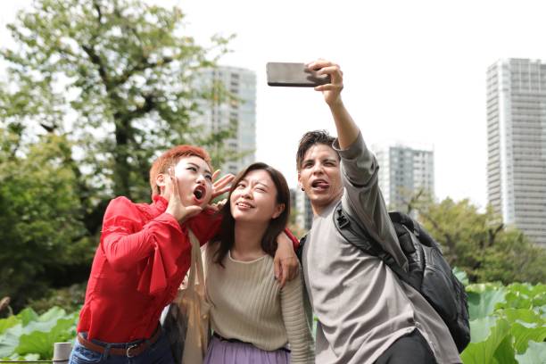 istock Happy diverse friends on vacation 1421350562