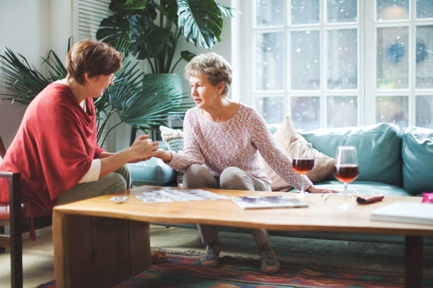 istock Two active senior women reading the cards 1421351849