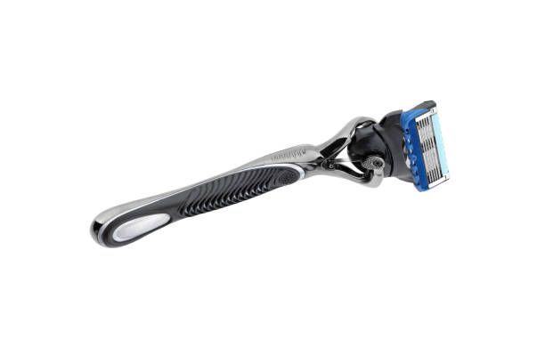 istock Shaving blade on a white background. Razor close-up on a white background. 1421354412