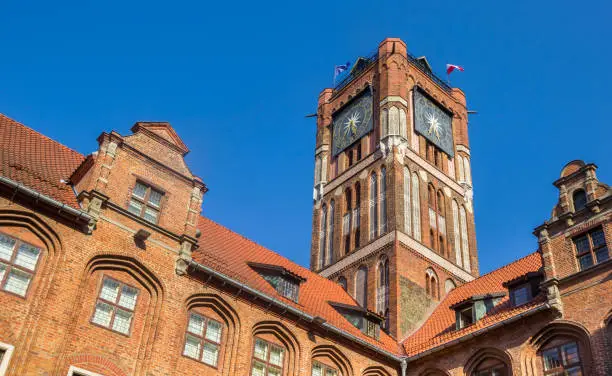 Clock tower of the historic town hall building in Torun, Poland