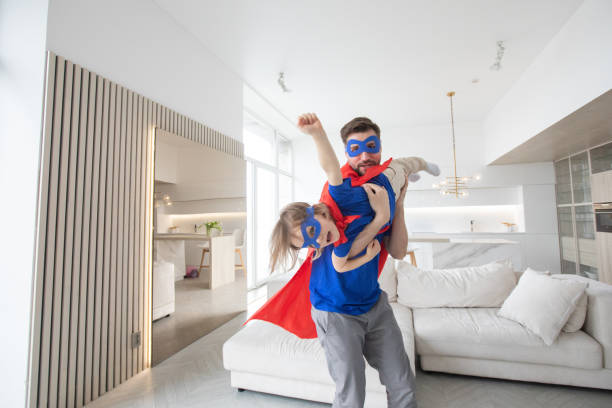 istock Father and son play superhero 1421366441