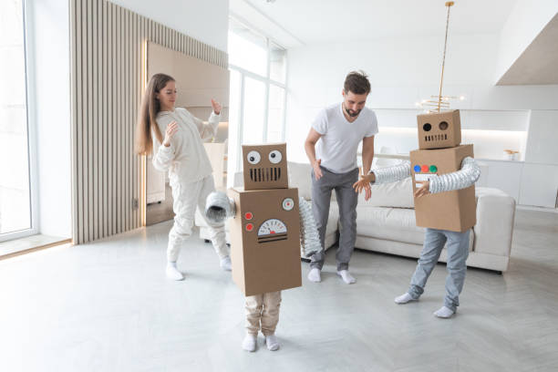 istock Family playing robots at home 1421366477