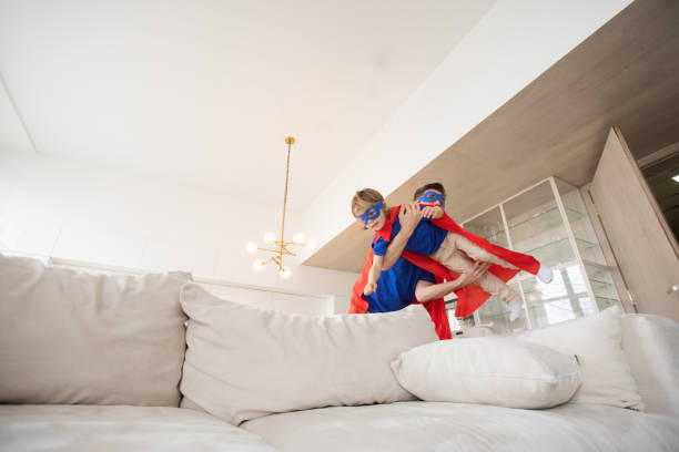 istock Father and son play superhero 1421366483