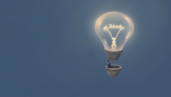 Businessman and a balloon of lightbulb tree. Concept idea art of business and success. conceptual surreal illustration.