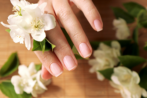 Classic manicure with a shiny top coat for nails.