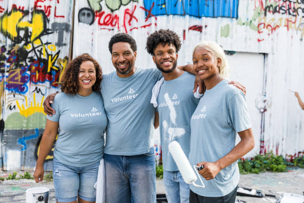 istock Family smiles at the camera 1421375855